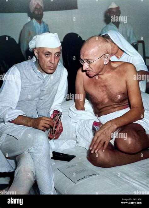 JAWAHARLAL NEHRU at left with Mahatma Gandhi at a meeting of the Indian Congress Party in Bombay ...