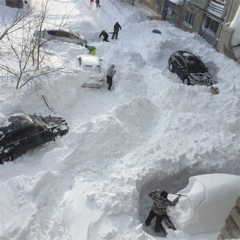 Watch These Russian Surfers Hit 70ft Waves In Minus 10 Degree Snowstorm