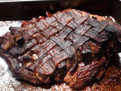 This Tasty Smoked Bacon Brisket Is Filled And Topped With Bacon