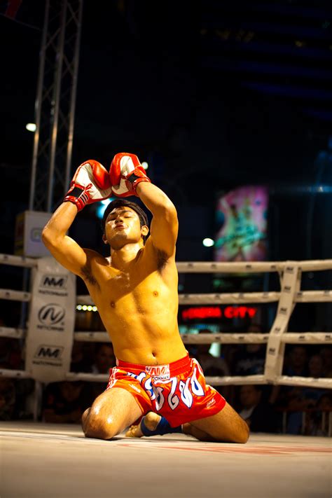 Muay Thai Preparation - A muay thai fighter prepares for his bout by ...