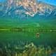 Canoeing in a emerald green lake in the Canadian Rockies image - Free stock photo - Public ...