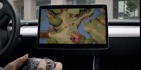 First look at Tesla's new in-car video game system with Cuphead and ...