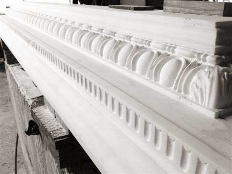 Egg and dart molding hand carved into White statuario @huntstudios | Floor trim, Millwork, Carving