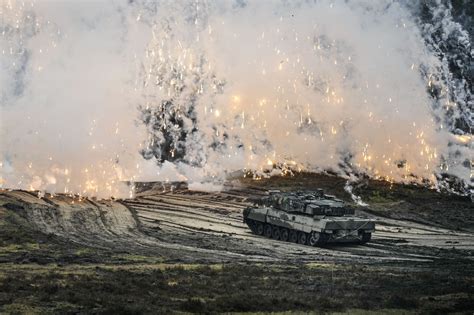 Poland delivers first German Leopard tanks to Ukraine | The Times of Israel