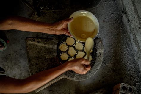 Close-Up Shot of a Person Cooking a Vietnamese Food · Free Stock Photo