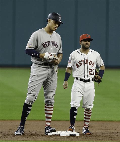 Aaron Judge standing beside of Jose Altuve today. : r/baseball