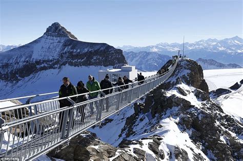 The 9,800 feet-high Peak Walk bridge inaugurated in the Swiss Alps | Daily Mail Online