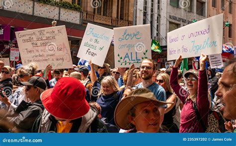 Melbourne, Victoria Australia - November 20 2021: People Hold Up Peaceful Protest Signs ...