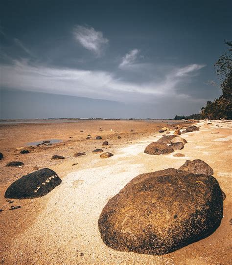 Photo Of Rocks On Seashore · Free Stock Photo