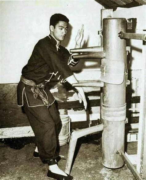 Bruce Lee, Wing Chun dummy practice. We all started somewhere ...