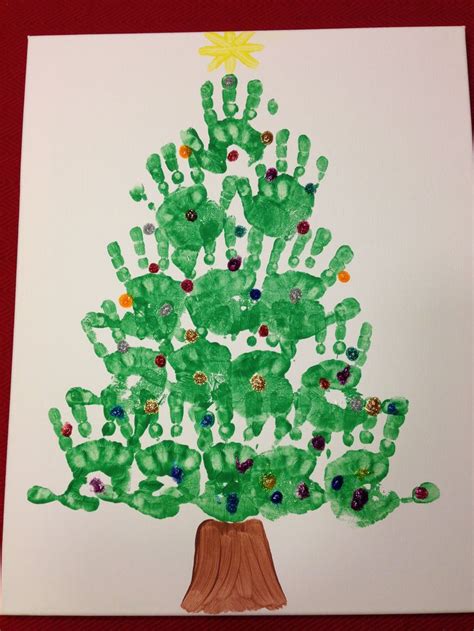 Handprint Christmas tree with glitter glue ornaments/lights! | Handprint christmas tree, Diy ...