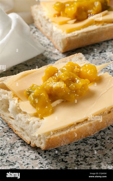 Cheese and piccalilli sandwich Stock Photo - Alamy