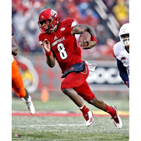 This original photograph captures Lamar Jackson in action. It is officially licensed by the NCAA ...