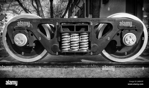 A closeup view of the wheels of a train Stock Photo - Alamy