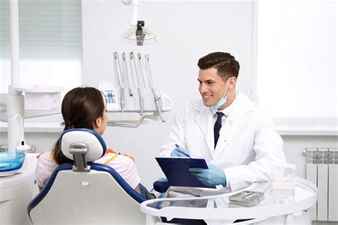 Professional Dentist Working with Patient Stock Photo - Image of medical, orthodontic: 153303012