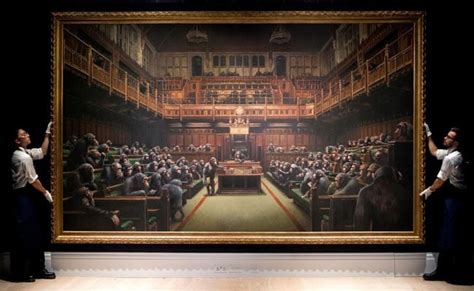 Banksy's UK Parliament Painting Sells For $12.1 Million At Auction