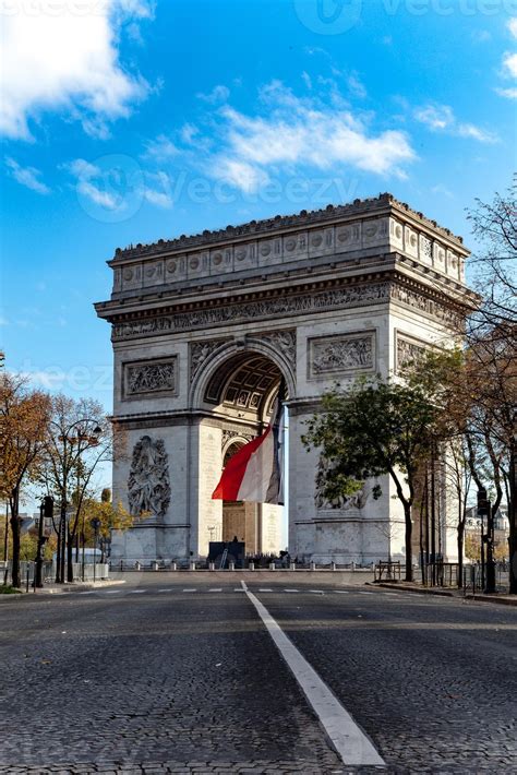 French flag under Arc de Triomphe in Paris 911658 Stock Photo at Vecteezy