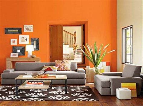 Living Room Paint Color with orange wall : Bonasty | Modern living room paint, Living room ...