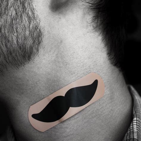 Mustache bandage. I'd dare a guy to work that bandage with a suit ...