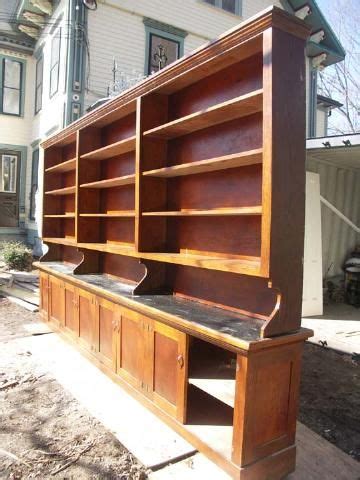 Old Wooden Bookcase in Front of a House