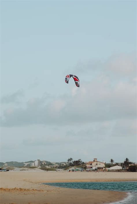 A Kite Flying over the Beach · Free Stock Photo