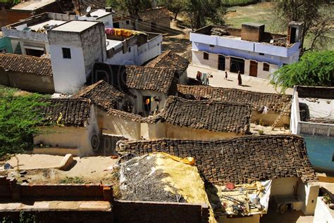 Photo of Village Houses by Photo Stock Source village, Alipura, Madhya Pradesh, India, river ...