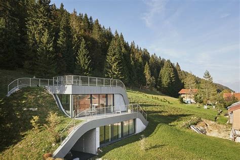 Swooping French Home Is Partially Built Into a Hillside - Curbed