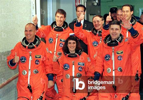 Image of The crew of the space shuttle Endeavour depart from their