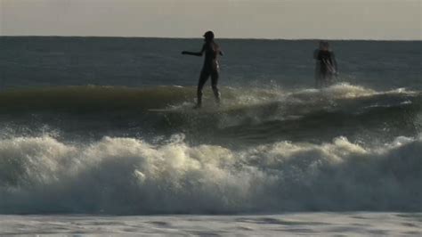 Presidential candidate Tulsi Gabbard goes surfing