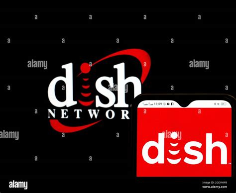 In this photo illustration a DISH Network Corporation logo seen ...