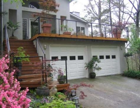 Balcony over Garage | Deck Over Garage Handrail | If I had an ... | Deck over garage, Rooftop ...