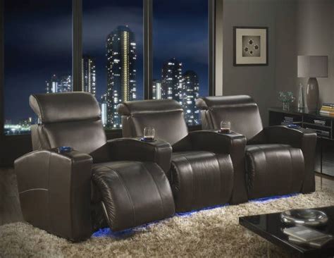 Power reclining home theater seating with neon lights. Made in Canada. Fully Custom in Fabric or ...