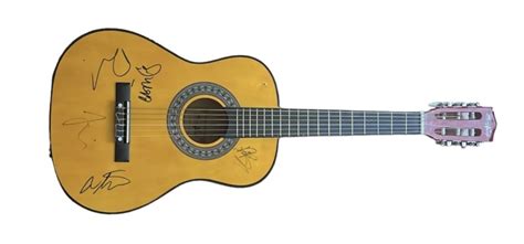 Foo Fighters Signed Acoustic Guitar - CharityStars