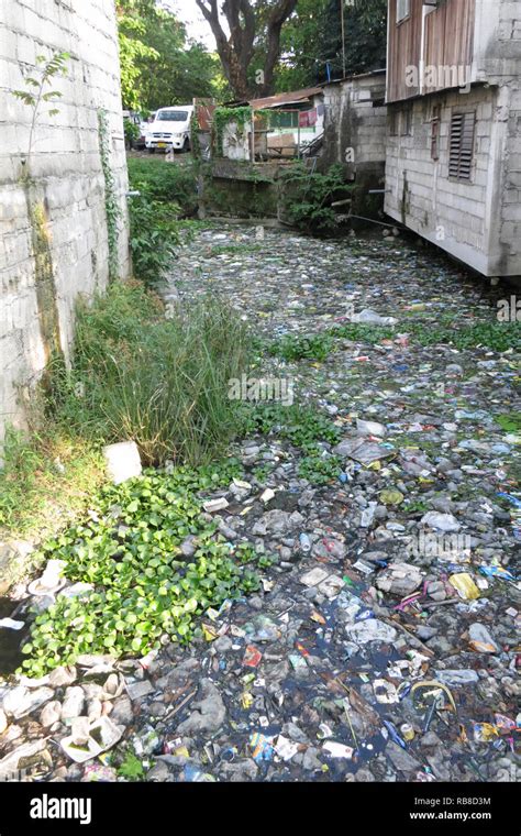 Pollution of a river in Philippines Stock Photo - Alamy