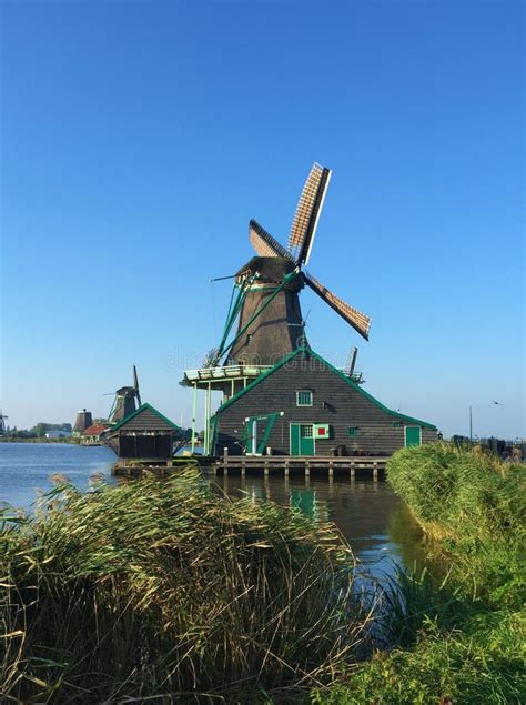 Windmills at Zaanse Schans in North Holland Stock Photo - Image of ...