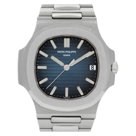 A silver Patek Philippe watch with a blue dial.