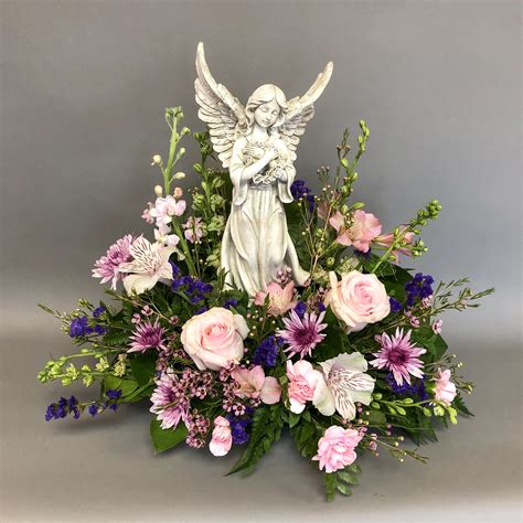 Angel Sympathy Floral Arrangement | Funeral flower arrangements ...