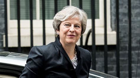 Theresa May reshuffles 'new generation' of diverse ministers into ...