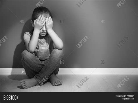 Sad Little Girl Sitting Crying