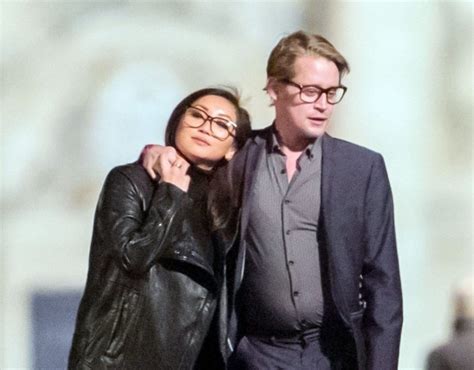 Macaulay Culkin looks happy and loved up with girlfriend Brenda Song ...