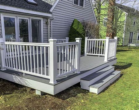 Trex deck with Timbertech Radiance Railings in Concord, MA - Tom Curren Companies