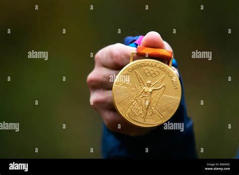 Gold medal from the 2004 Summer Olympics in Athens Stock Photo - Alamy