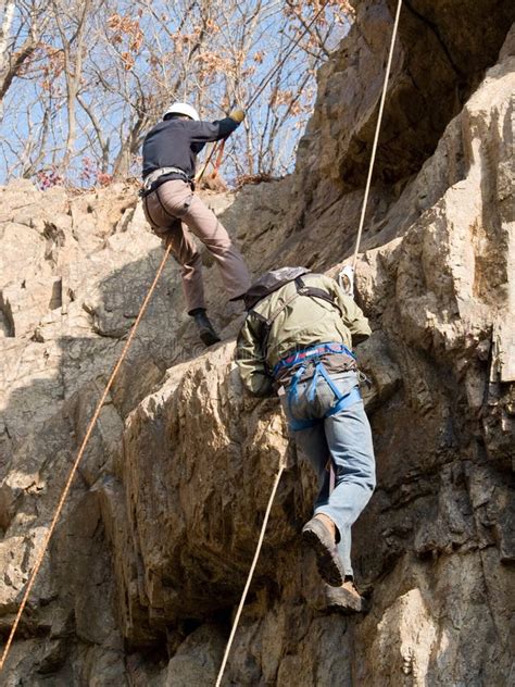 Mountaineer climbing up stock photo. Image of holiday - 4417718