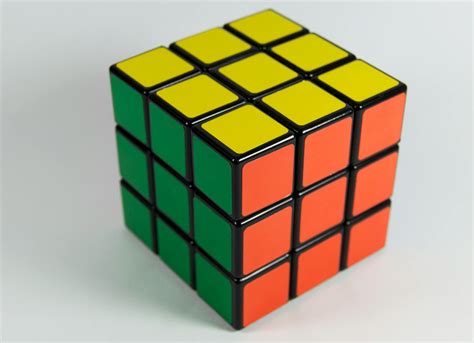 Yellow, Orange, and Green 3x3 Rubik's Cube · Free Stock Photo