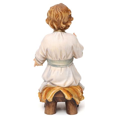 Baby Jesus sitting in the manger statue in wood, Val Gardena | online sales on HOLYART.co.uk