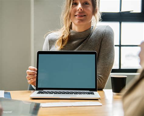 Happy woman with a blank laptop screen | Free for commercial… | Flickr