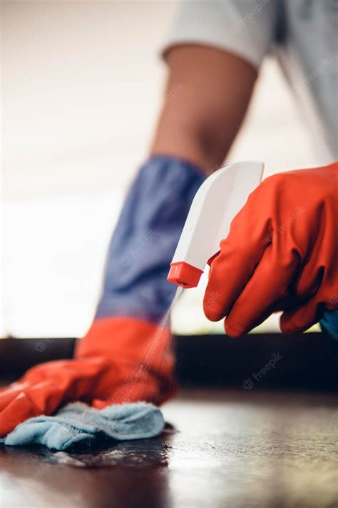 Premium Photo | Alcohol, disinfectant spray on table. cleaning with ...