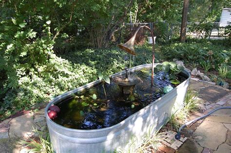 Stock trough fountain | The fountain is made from pieces of … | Flickr Fountains Backyard, Water ...