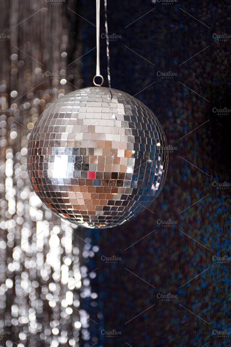 Mirror disco ball hanging from the ceiling stock photo containing disco ...