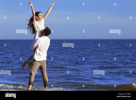 Family beach hug wet hi-res stock photography and images - Alamy